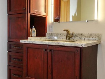 Material: Distressed Knotty Alder with Red Stain & Black Glaze / Cabinet Style: Overlay