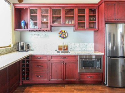 Material: Distressed Knotty Alder with Red Stain & Black Glaze / Cabinet Style: Overlay Capitola Guest House